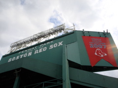 Behind the centerfield scoreboard